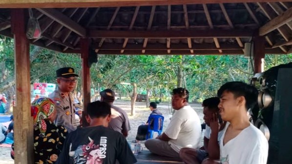 Menjaga Keamanan Pilkada 2024: Polres Lombok Barat Lakukan Sosialisasi Kamtibmas di Banyumulek