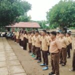 Police Goes to School Bhabinkamtibmas Polsek Labangka Latih PBB Siswa-Siswi SDN Labangka