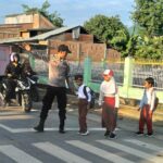 Polsek Lambu Laksanakan Rawan Pagi di SDN 02 Sumi Lambu