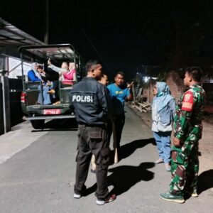 Bhabinkamtibmas Kelurahan Menala Dampingi Operasi Eliminasi Anjing Liar Guna Cegah Penyebaran Rabies