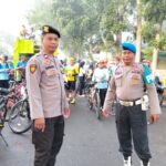 Personel Gabungan Polres Bima Kota Amankan Jalur Titik Start Fun Bike Festival Sangiang Api