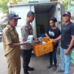 Bhabinkamtibmas Nungga Pantau Pendistribusian Makan Bergizi Gratis di Rasanae Timur