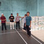 BHABINKAMTIBMAS DESA PENGENJEK LAKUKAN MONITORING PENDISTRIBUSIAN BERAS BANTUAN PEMERINTAH