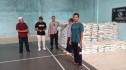 BHABINKAMTIBMAS DESA PENGENJEK LAKUKAN MONITORING PENDISTRIBUSIAN BERAS BANTUAN PEMERINTAH
